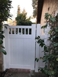 White vinyl gate with picket accent