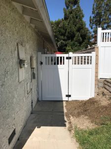 White vinyl gate with picket accent